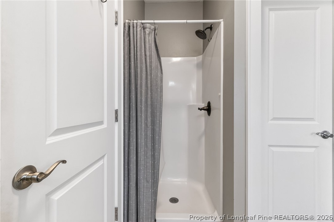 124 Riviera Lane Sanford, NC 27332 - Photo 25 of 45 a bathroom with a shower