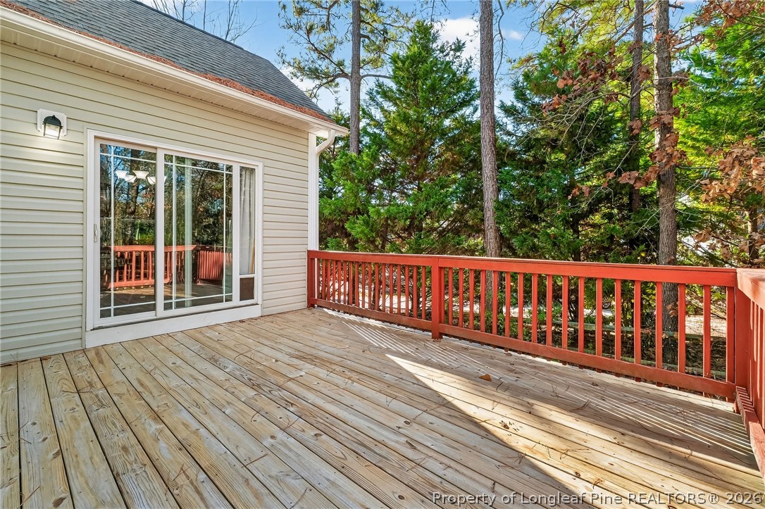 124 Riviera Lane Sanford, NC 27332 - Photo 36 of 45 a view of a wooden deck
