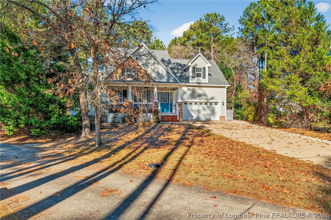 124 Riviera Lane Sanford, NC 27332 - Photo 4 of 45 front view of house with a yard