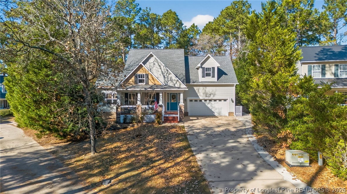 124 Riviera Lane Sanford, NC 27332 - Photo 45 of 45 a front view of a house with garden