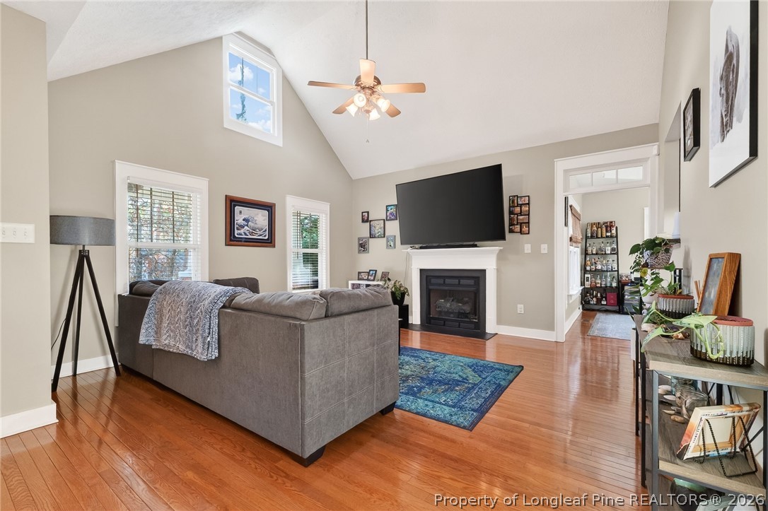 124 Riviera Lane Sanford, NC 27332 - Photo 6 of 45 a living room with furniture and a flat screen tv