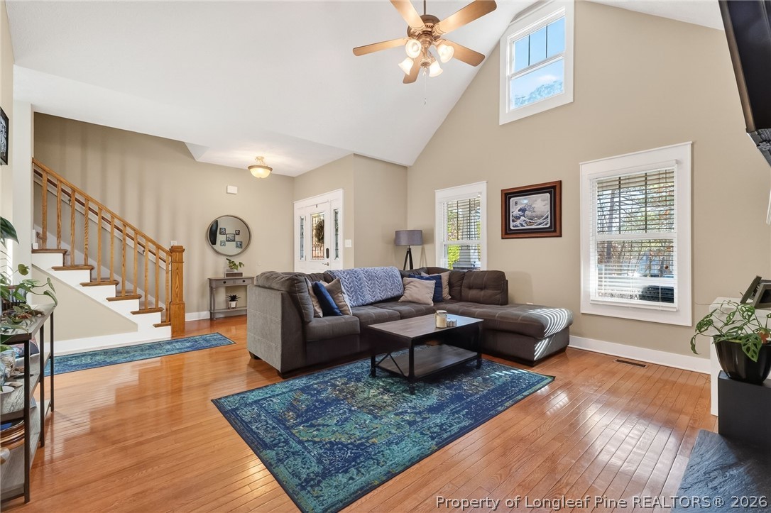124 Riviera Lane Sanford, NC 27332 - Photo 7 of 45 a living room with furniture wooden floor and a window