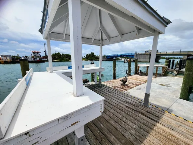 a view of roof deck with patio