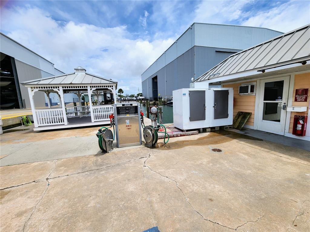 100 Circuit Road, Unit S35 Nokomis, FL 34275 - Photo 14 of 35 a view of a house with chairs in front of it