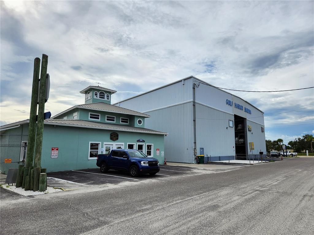 100 Circuit Road, Unit S35 Nokomis, FL 34275 - Photo 19 of 35 a view of a car parked in front of a building