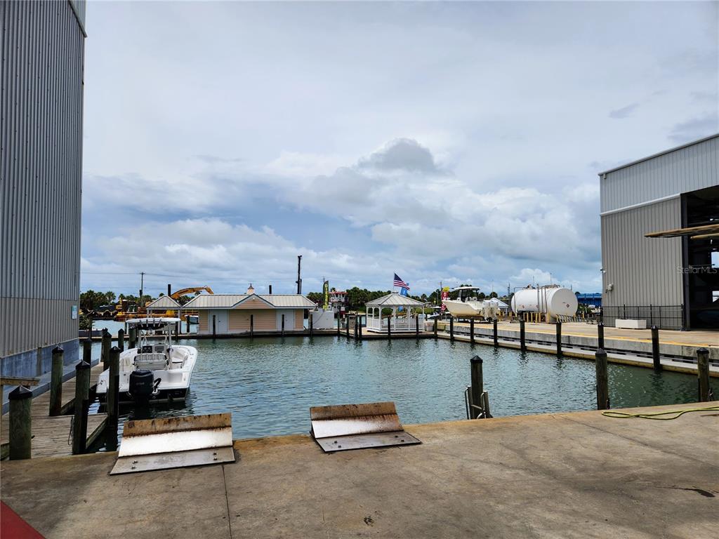 100 Circuit Road, Unit S35 Nokomis, FL 34275 - Photo 21 of 35 a view of a terrace with chairs
