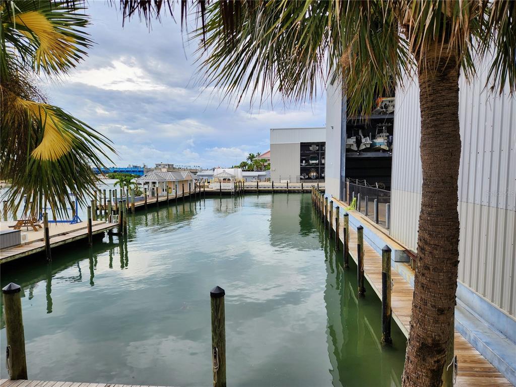 100 Circuit Road, Unit S35 Nokomis, FL 34275 - Photo 23 of 35 a view of swimming pool with a table and chairs