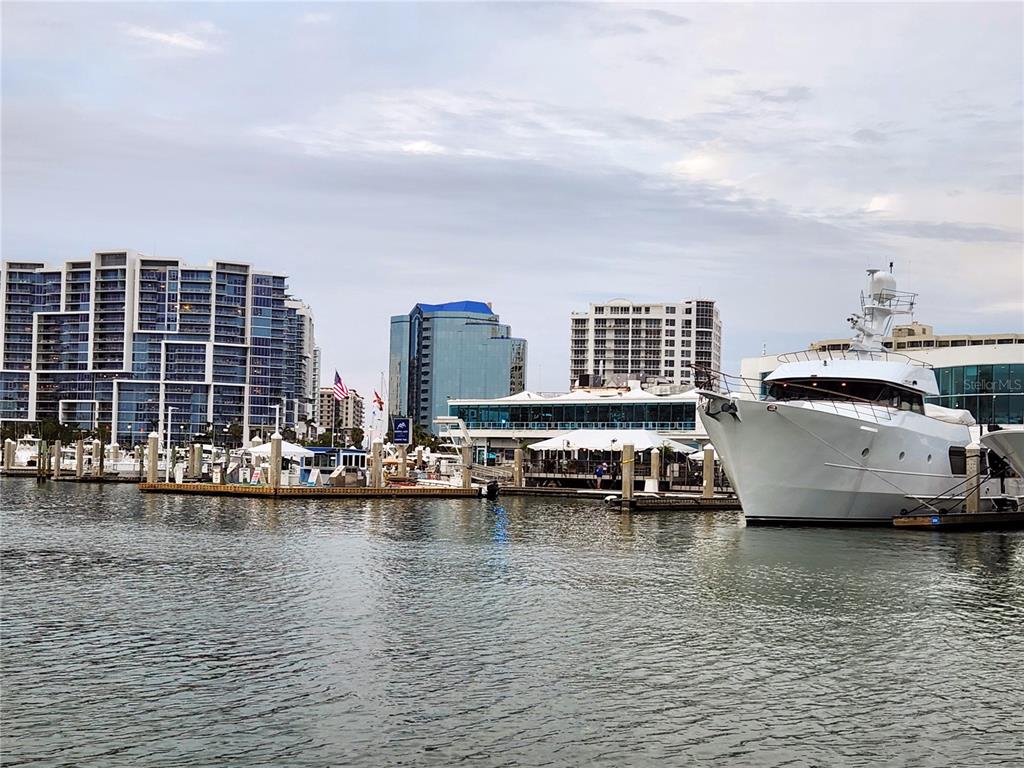 100 Circuit Road, Unit S35 Nokomis, FL 34275 - Photo 34 of 35 a view of a lake with tall buildings