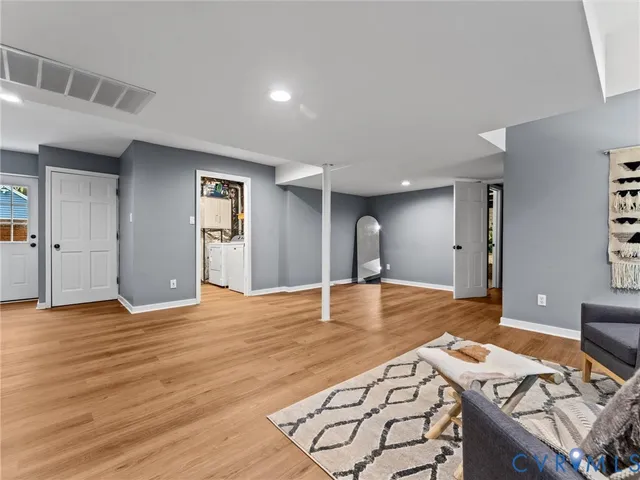 a bed room with a bed and a dresser