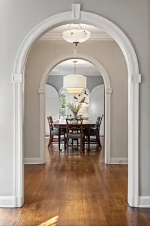 a view of a room with lots of dining table and chairs