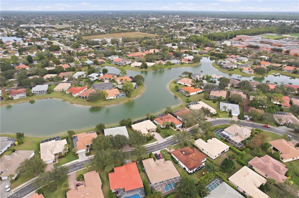 3948 Ruxton Road Naples, FL 34116 - Photo 41 of 43 an aerial view of a city with lots of residential buildings