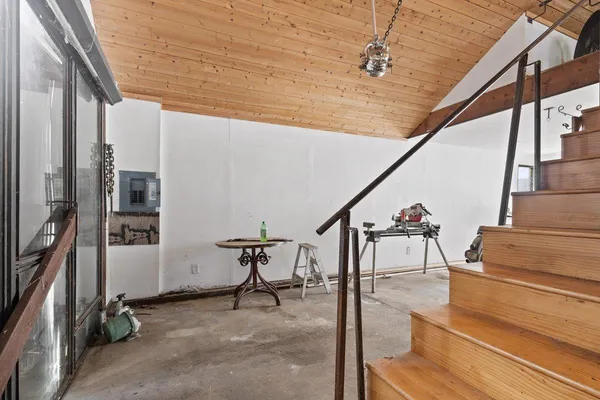 a view of storage and utility room with washer and dryer