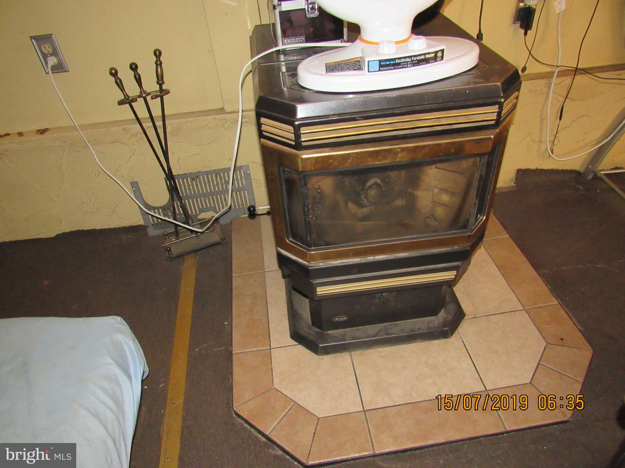 1917 Juniper Road Edgewood, MD 21040 - Photo 23 of 40 Pellet stove is in the addition