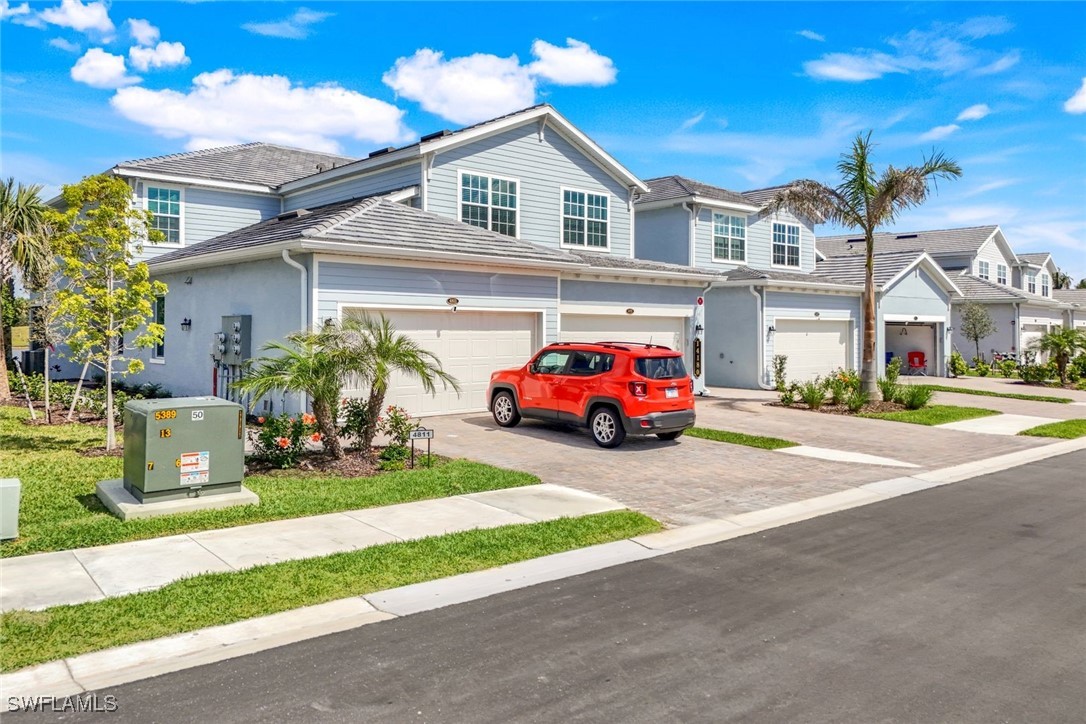 14180 Poppy Fld Loop, Unit 4821 Punta Gorda, FL 33955 - Photo 1 of 42 a house view with a outdoor space