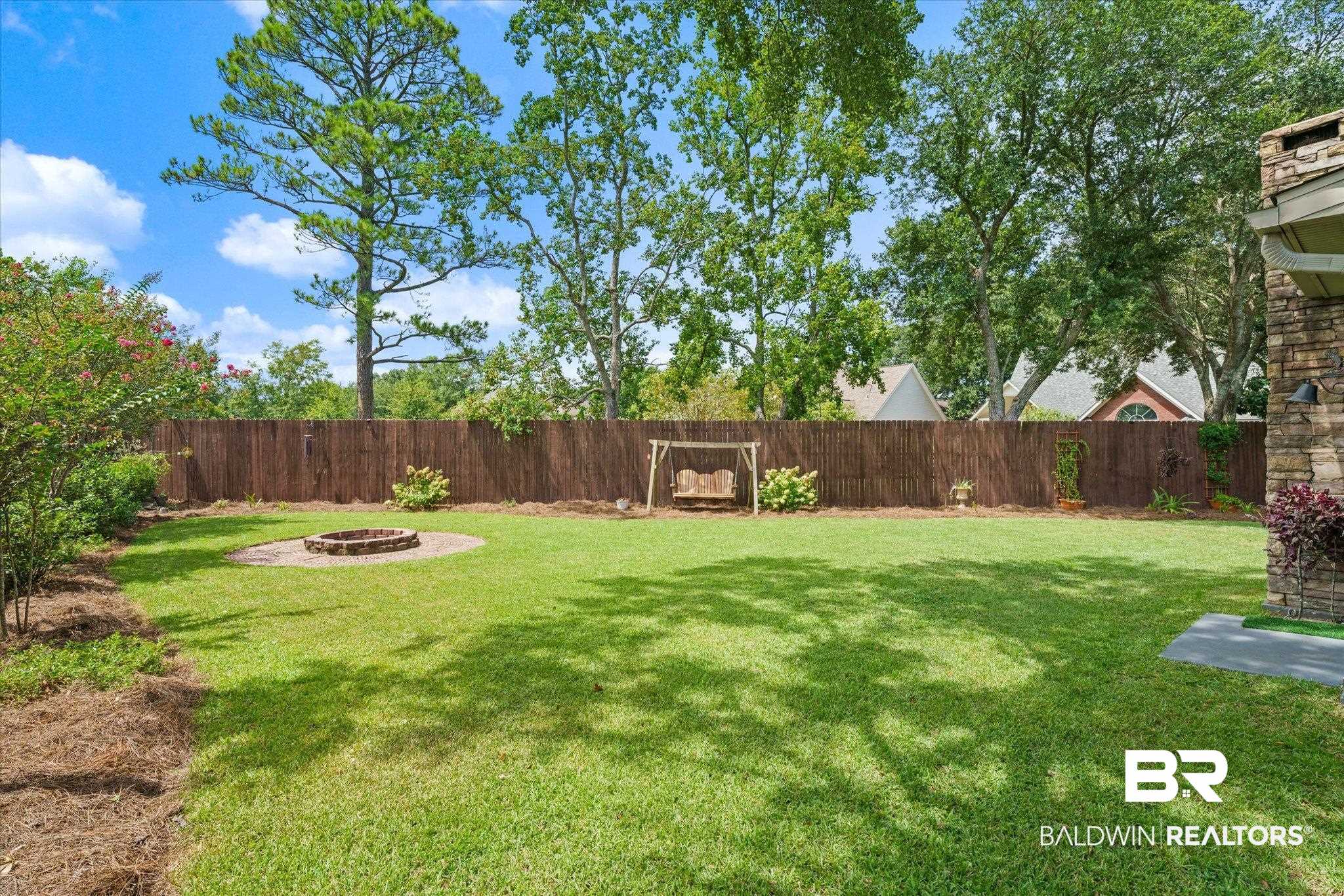 5683 Spring Landing Drive Theodore, AL 36582 - Photo 41 of 49 View of yard featuring a fire pit