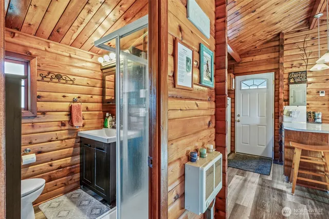 front view of a brick house with a large window