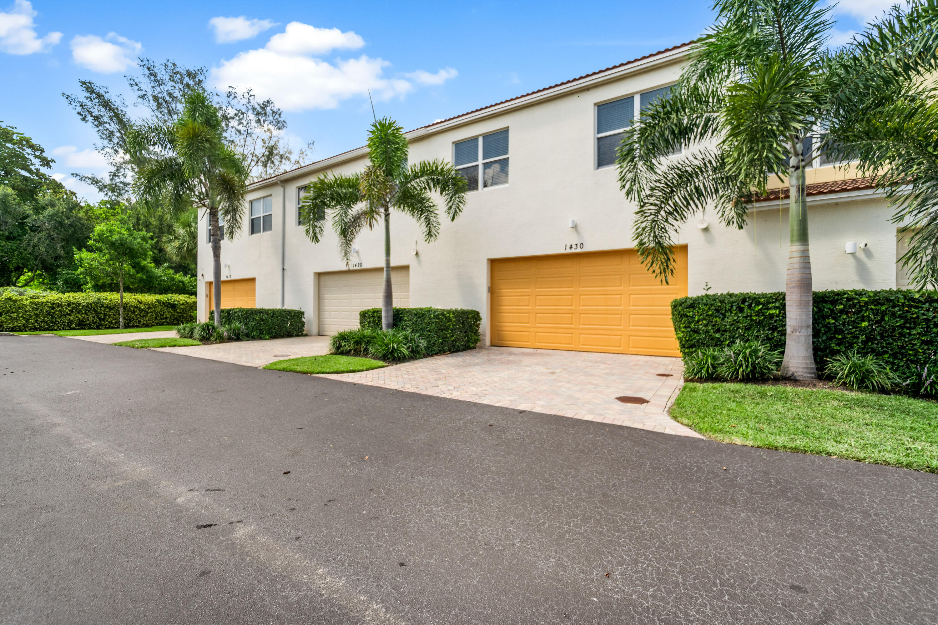 1430 Northwest 48th Lane Boca Raton, FL 33431 - Photo 31 of 54 a view of a house with a yard and garage