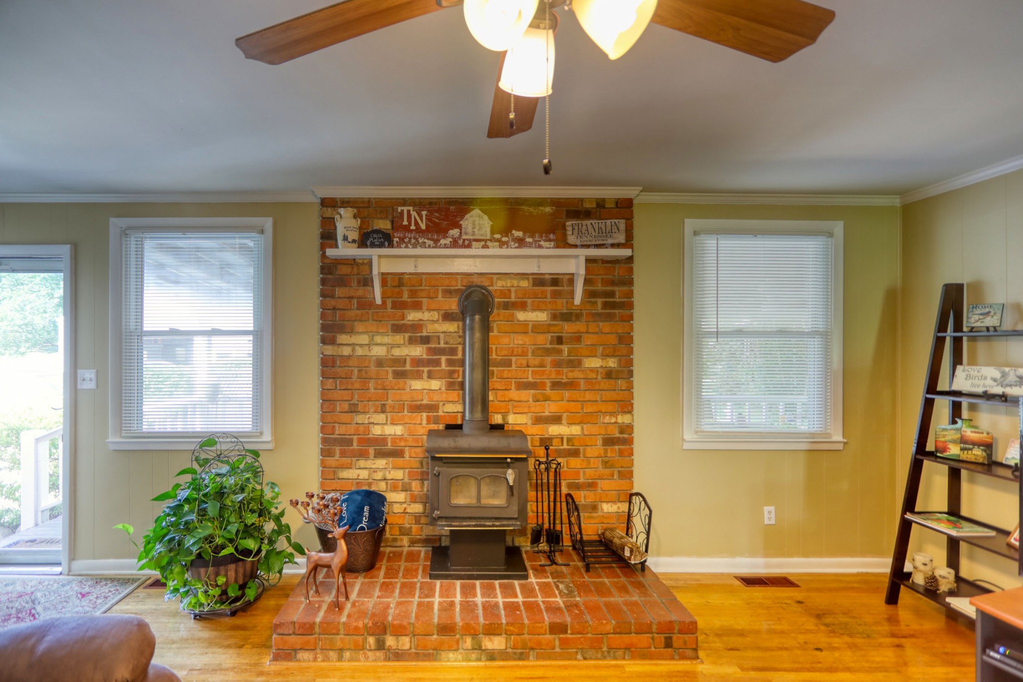 4644 East Robertson Road Cross Plains, TN 37049 - Photo 13 of 56 a living room with furniture and a floor to ceiling window