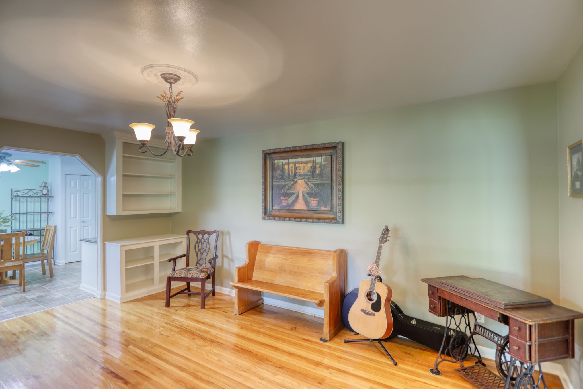 4644 East Robertson Road Cross Plains, TN 37049 - Photo 18 of 56 a living room with furniture a dining table and a piano