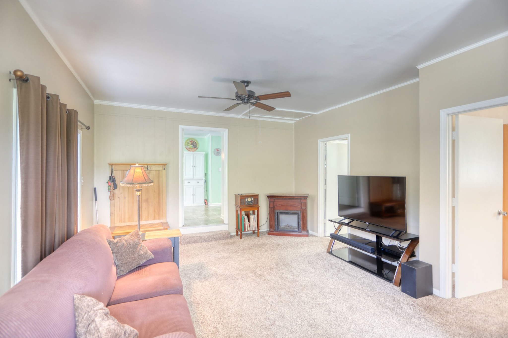 4644 East Robertson Road Cross Plains, TN 37049 - Photo 25 of 56 a living room with furniture and a flat screen tv