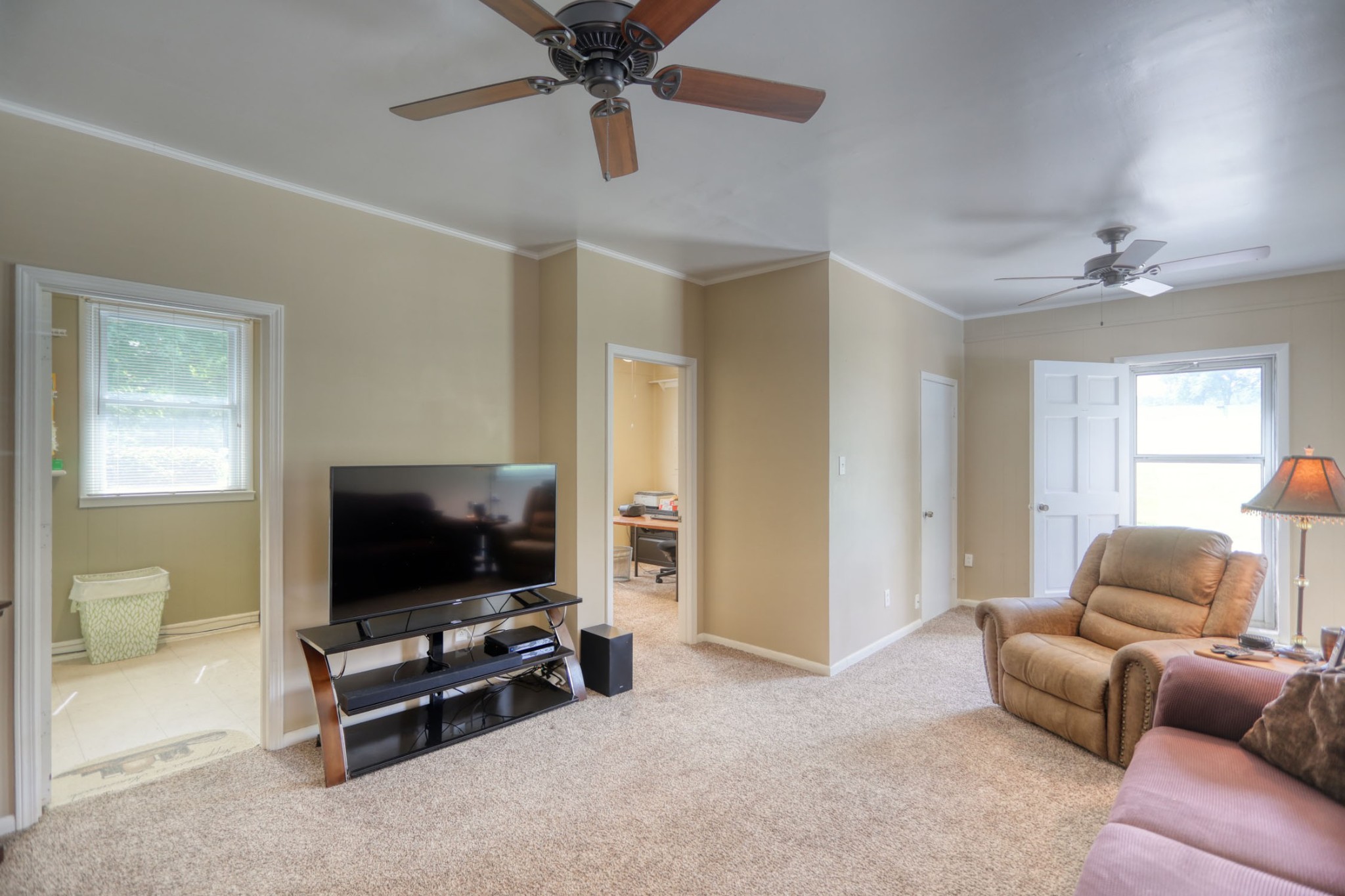 4644 East Robertson Road Cross Plains, TN 37049 - Photo 26 of 56 a living room with furniture and a flat screen tv