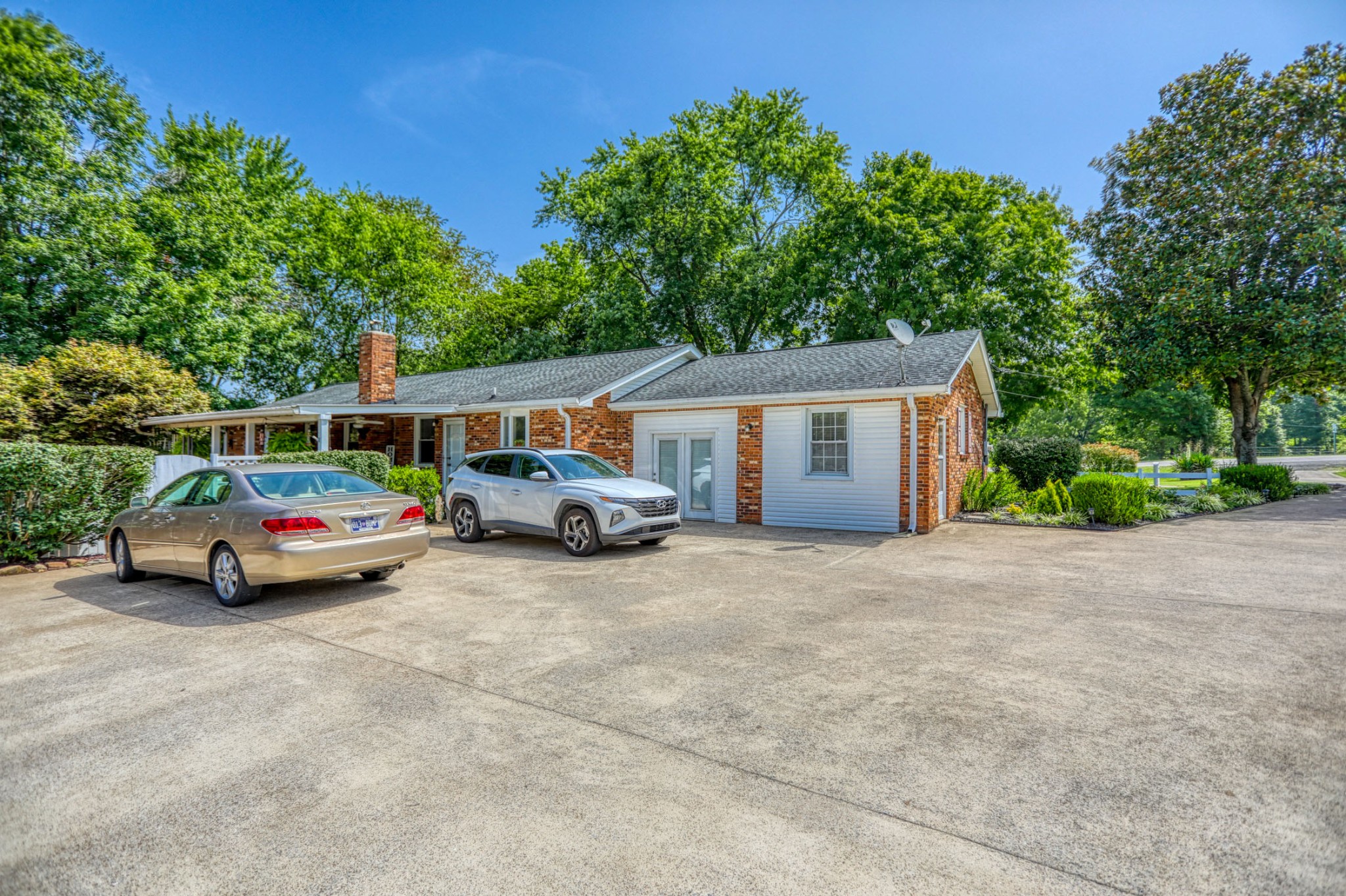 4644 East Robertson Road Cross Plains, TN 37049 - Photo 37 of 56 front view of a house with car parked