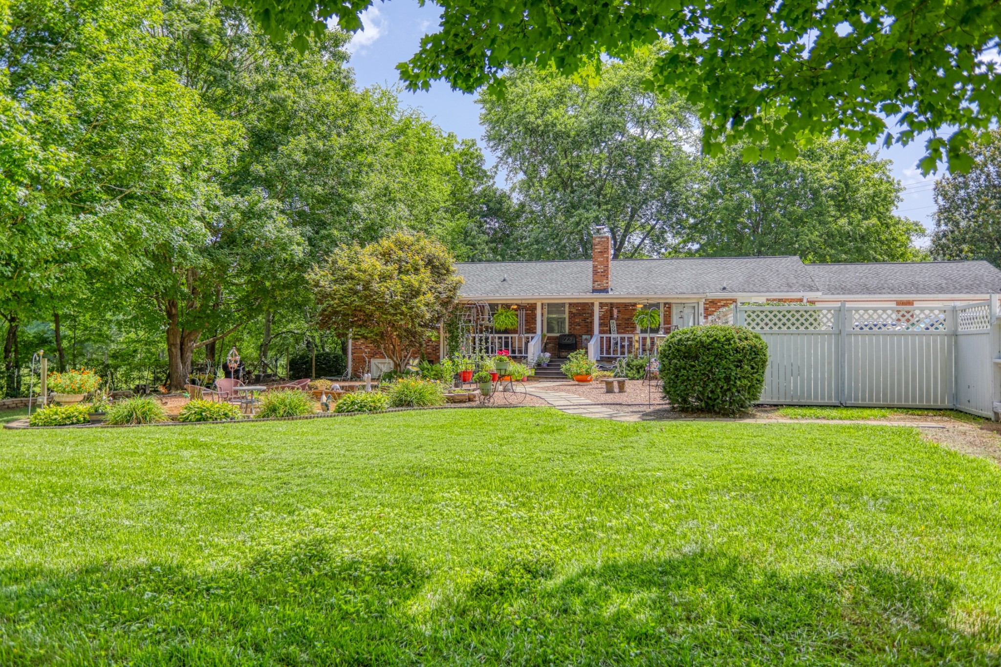 4644 East Robertson Road Cross Plains, TN 37049 - Photo 38 of 56 a view of a house with backyard and sitting area