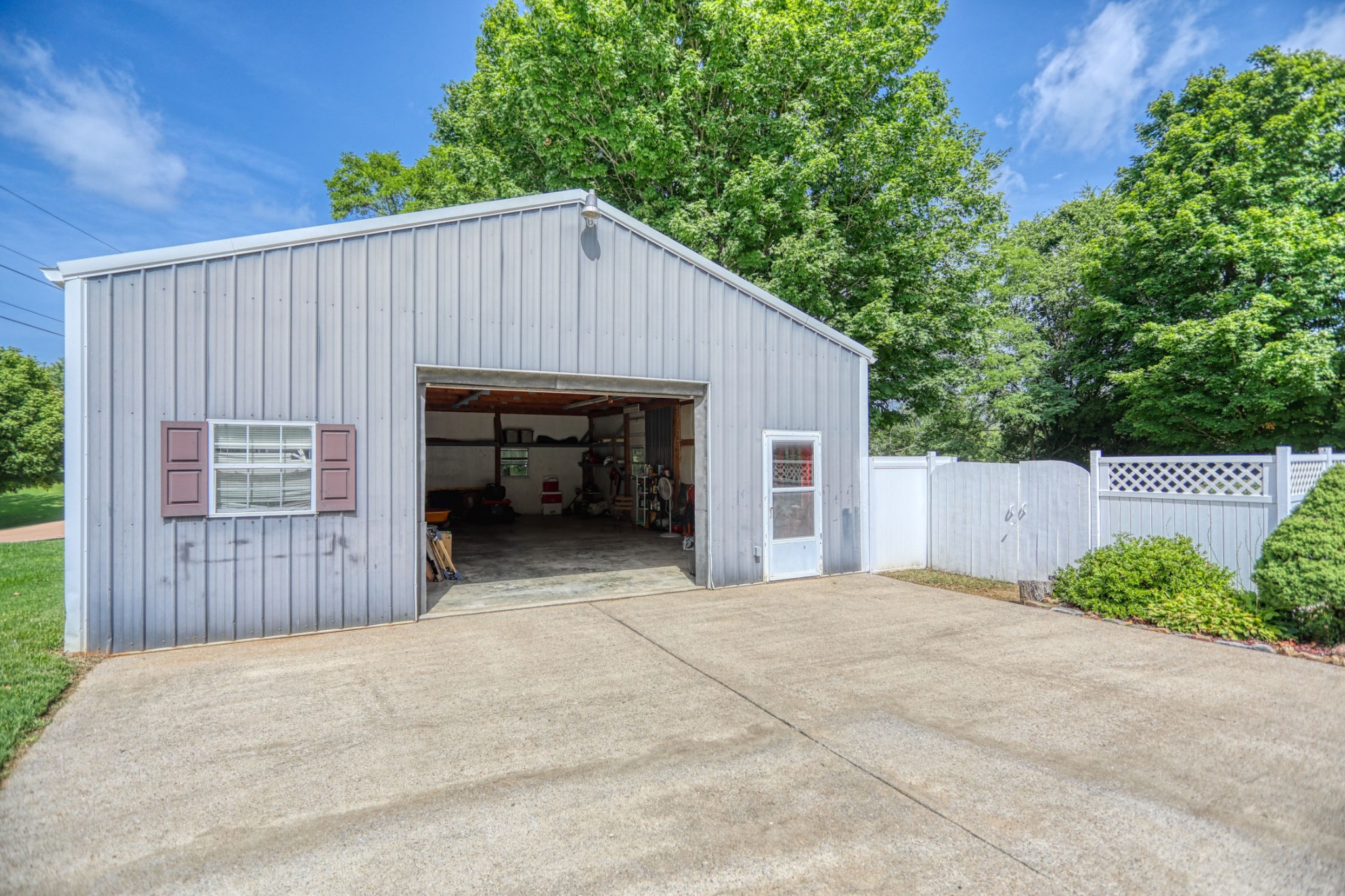 4644 East Robertson Road Cross Plains, TN 37049 - Photo 4 of 56 a view of a house with a garage