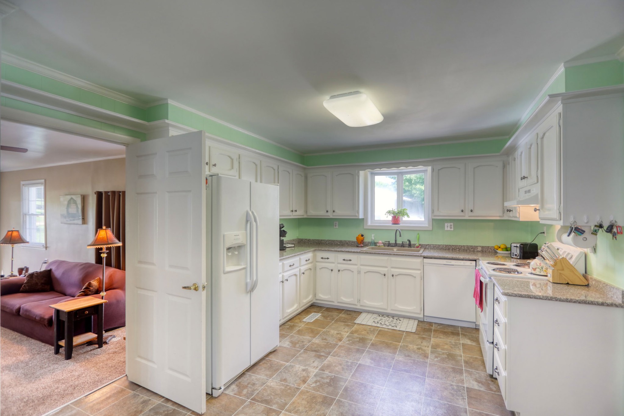 4644 East Robertson Road Cross Plains, TN 37049 - Photo 5 of 56 a kitchen with a sink cabinets and window