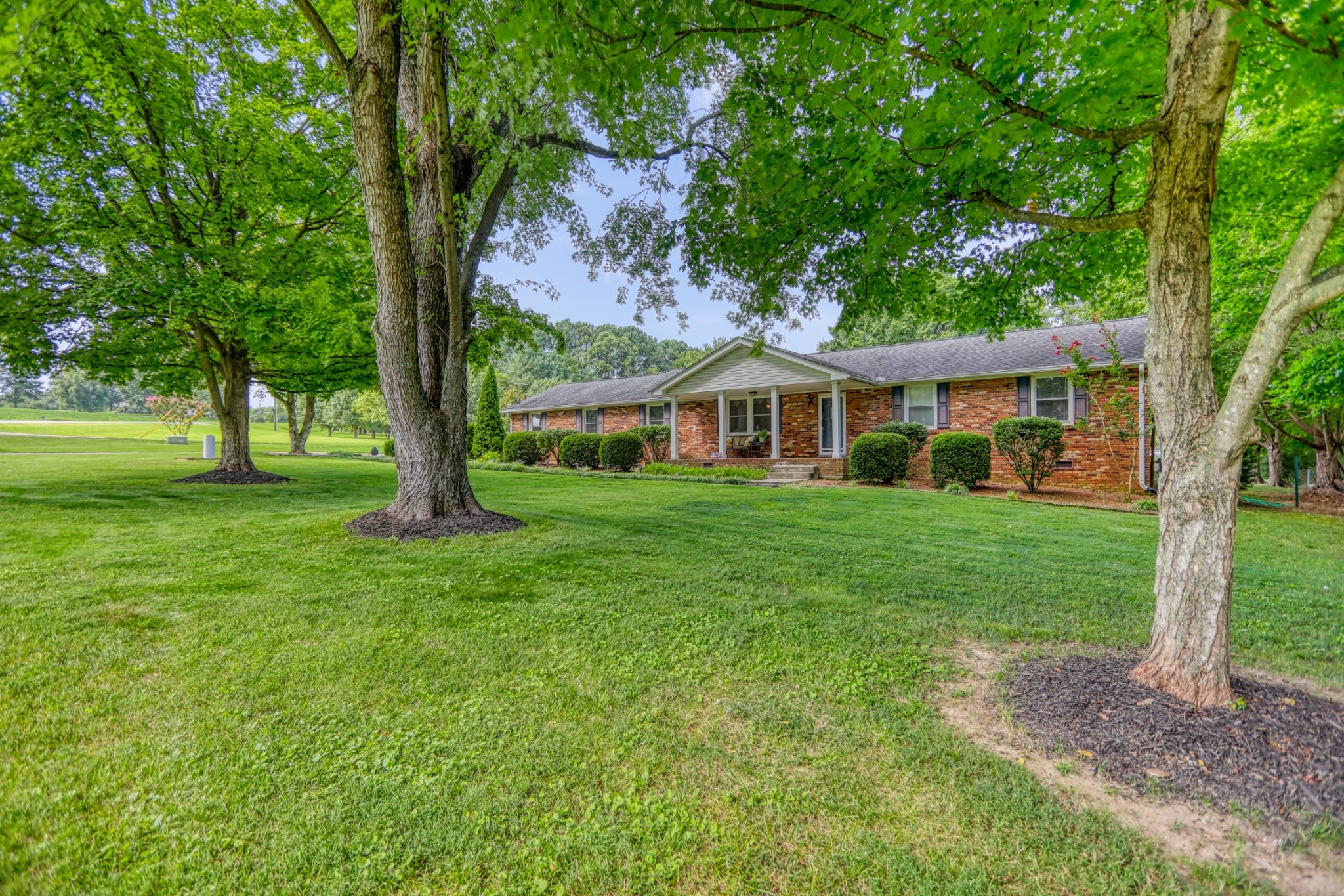 4644 East Robertson Road Cross Plains, TN 37049 - Photo 52 of 56 a front view of house with a garden