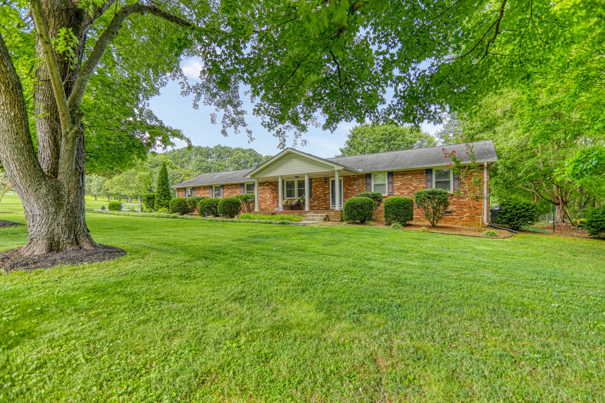 4644 East Robertson Road Cross Plains, TN 37049 - Photo 53 of 56 a front view of house with yard and green space