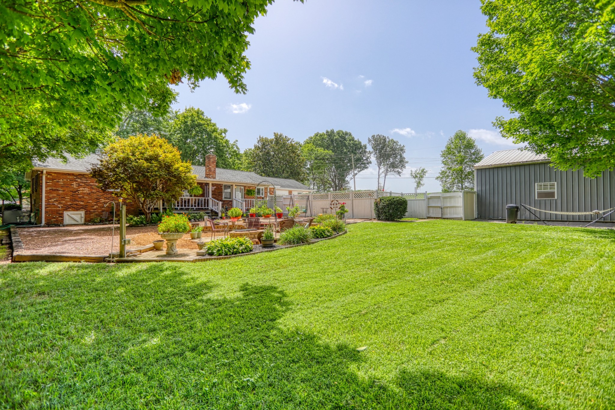 4644 East Robertson Road Cross Plains, TN 37049 - Photo 54 of 56 a view of house with backyard and a garden