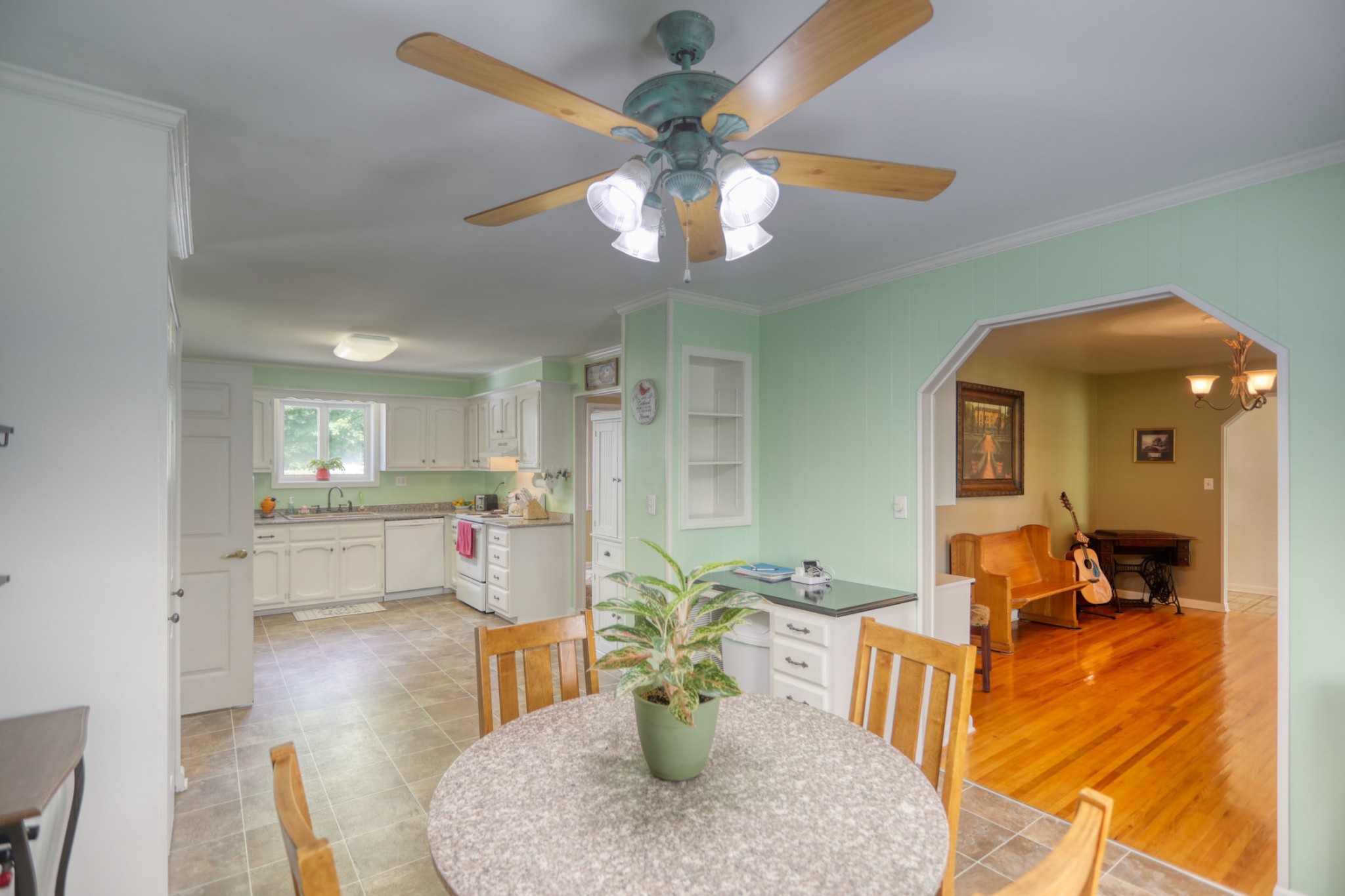 4644 East Robertson Road Cross Plains, TN 37049 - Photo 6 of 56 a view of a dining room with furniture and a chandelier