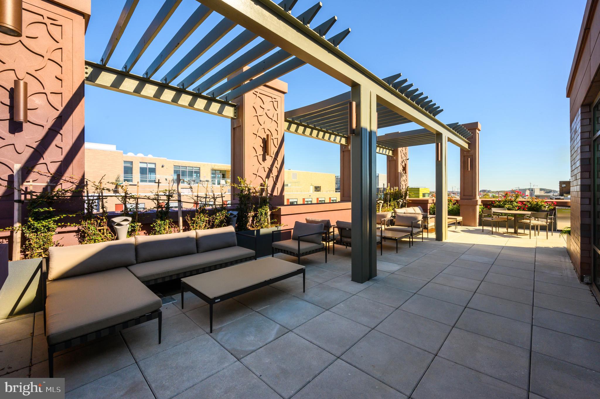 810 O Street Northwest, Unit 706 Washington, DC 20001 - Photo 12 of 48 a roof deck with couch