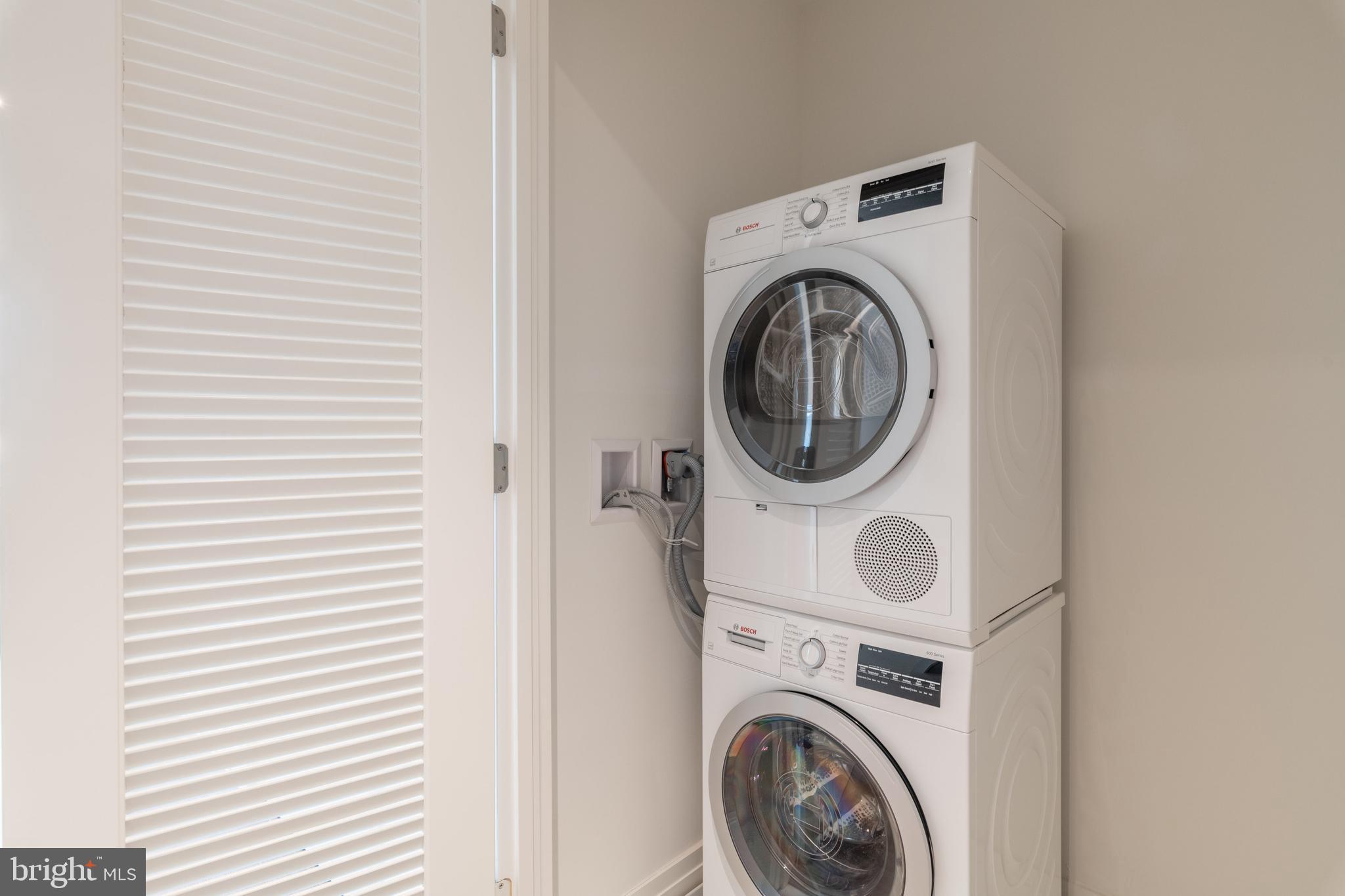 810 O Street Northwest, Unit 706 Washington, DC 20001 - Photo 24 of 48 a utility room with dryer and washer
