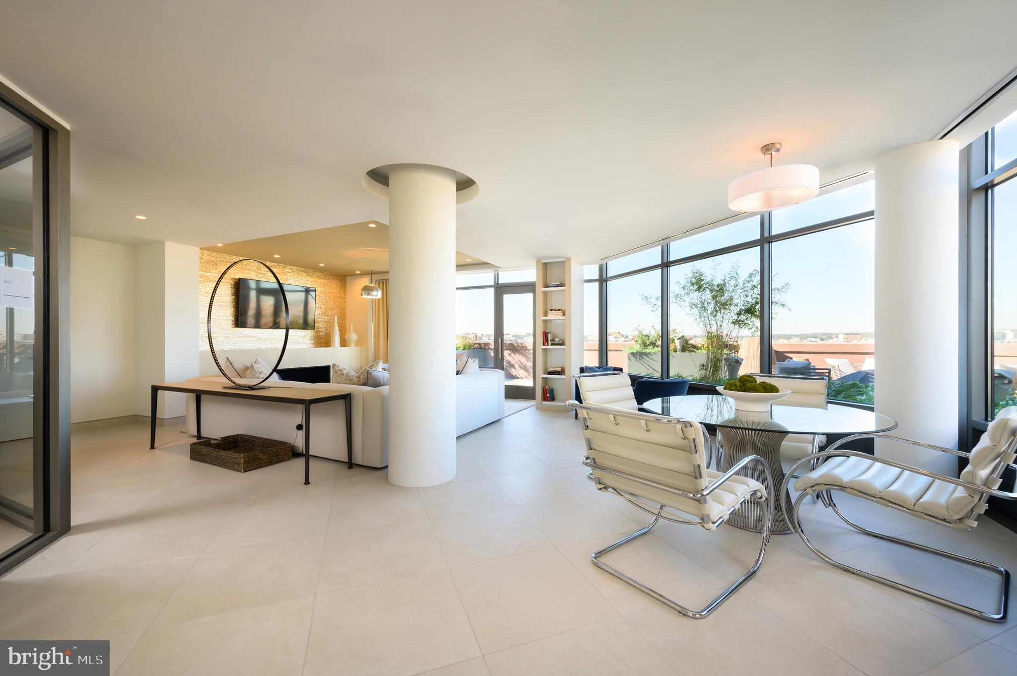 810 O Street Northwest, Unit 706 Washington, DC 20001 - Photo 7 of 48 a living room with fireplace furniture and a large window