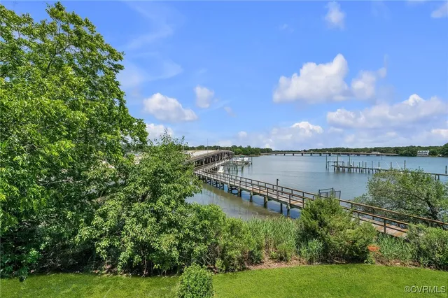 a view of a lake with a garden
