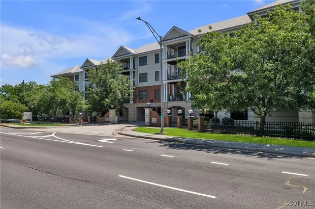 a view of a parked cars in front of a building