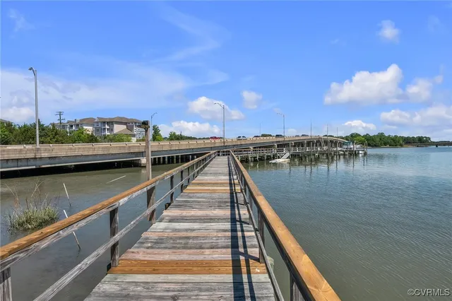 a view of swimming pool with a chairs