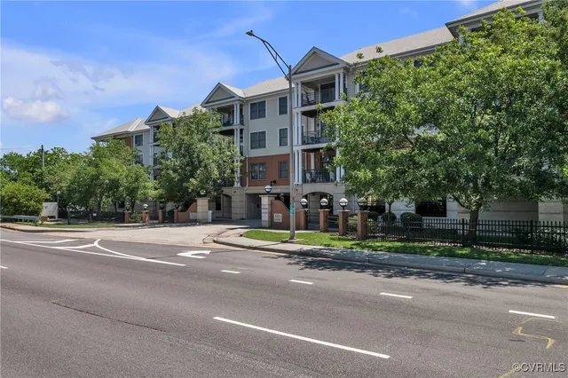 a view of a parked cars in front of a building