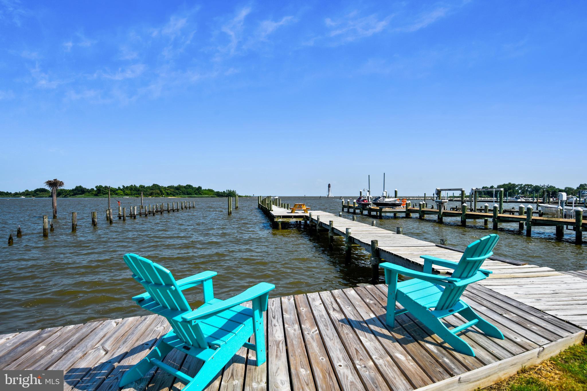 9109 Cuckold Point Road Baltimore, MD 21219 - Photo 7 of 37 a view of a lake with outdoor seating