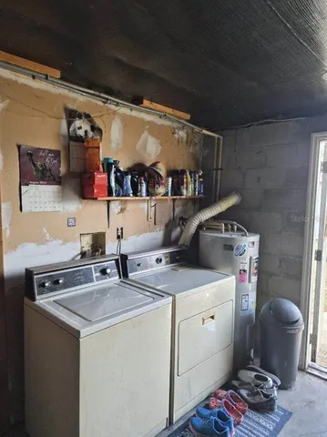 a utility room with dryer and washer