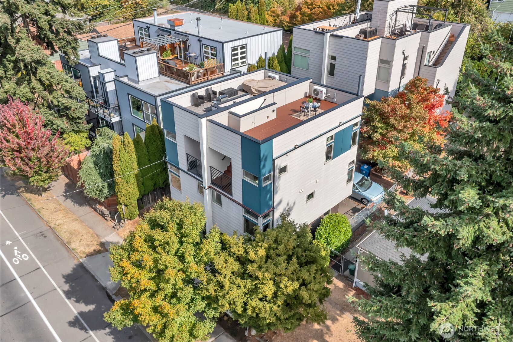 5008 Fauntleroy Way Southwest, Unit B Seattle, WA 98136 - Photo 1 of 36 a aerial view of a house with a yard and garden