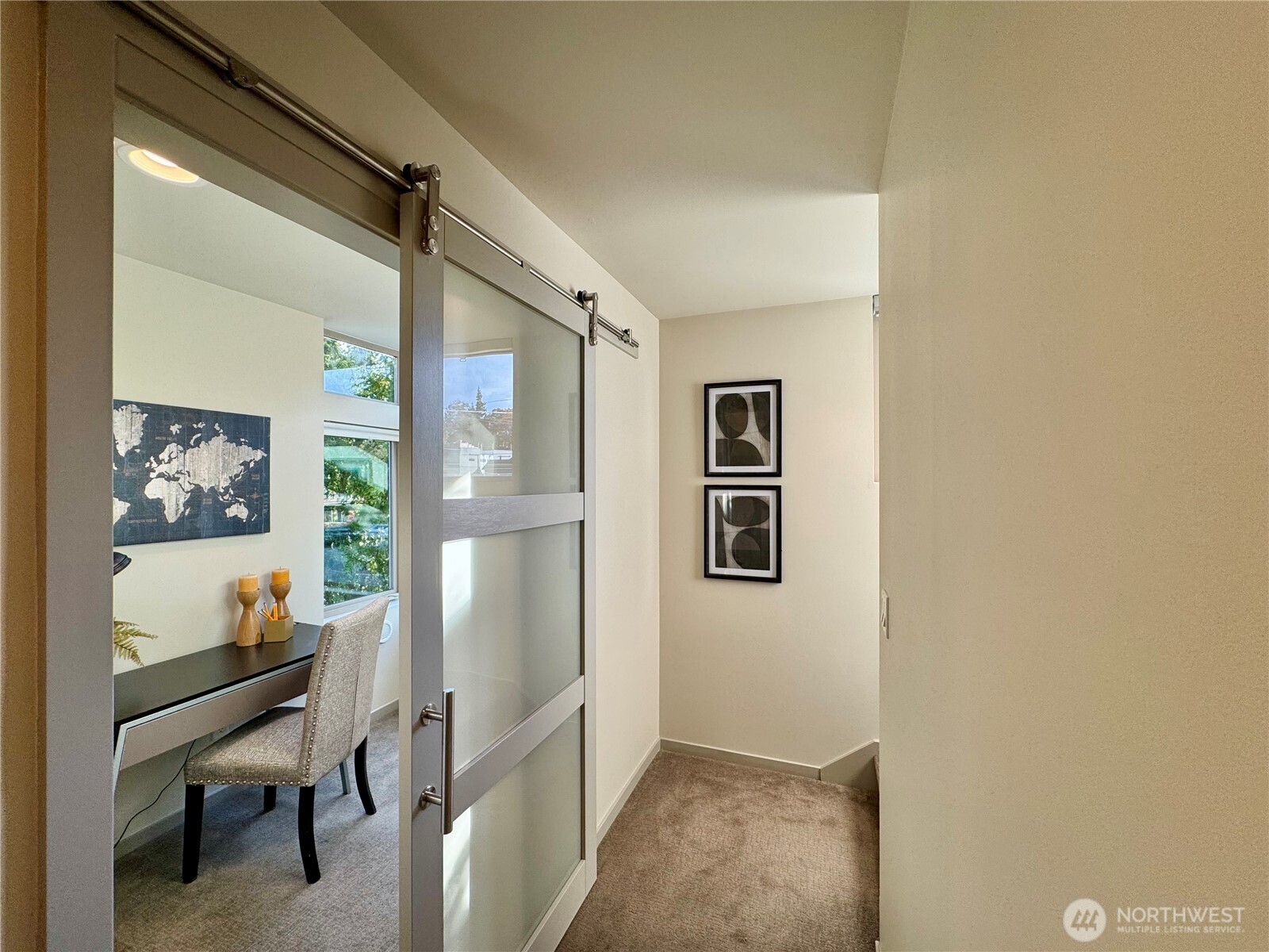 5008 Fauntleroy Way Southwest, Unit B Seattle, WA 98136 - Photo 23 of 36 a view of a livingroom with furniture and window