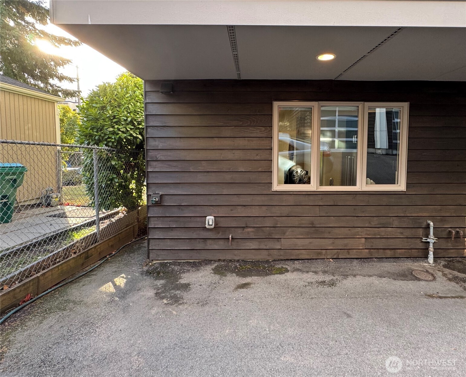 5008 Fauntleroy Way Southwest, Unit B Seattle, WA 98136 - Photo 32 of 36 a view of house with a yard