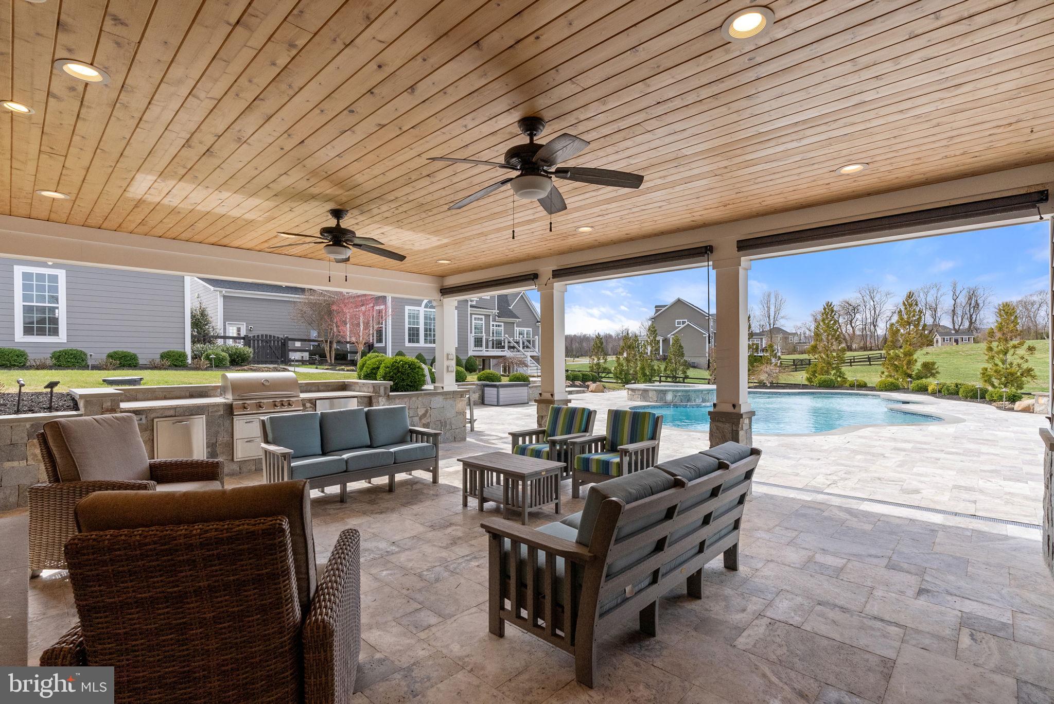 18482 Wild Raspberry Drive Purcellville, VA 20132 - Photo 110 of 143 a living room with furniture and a large window