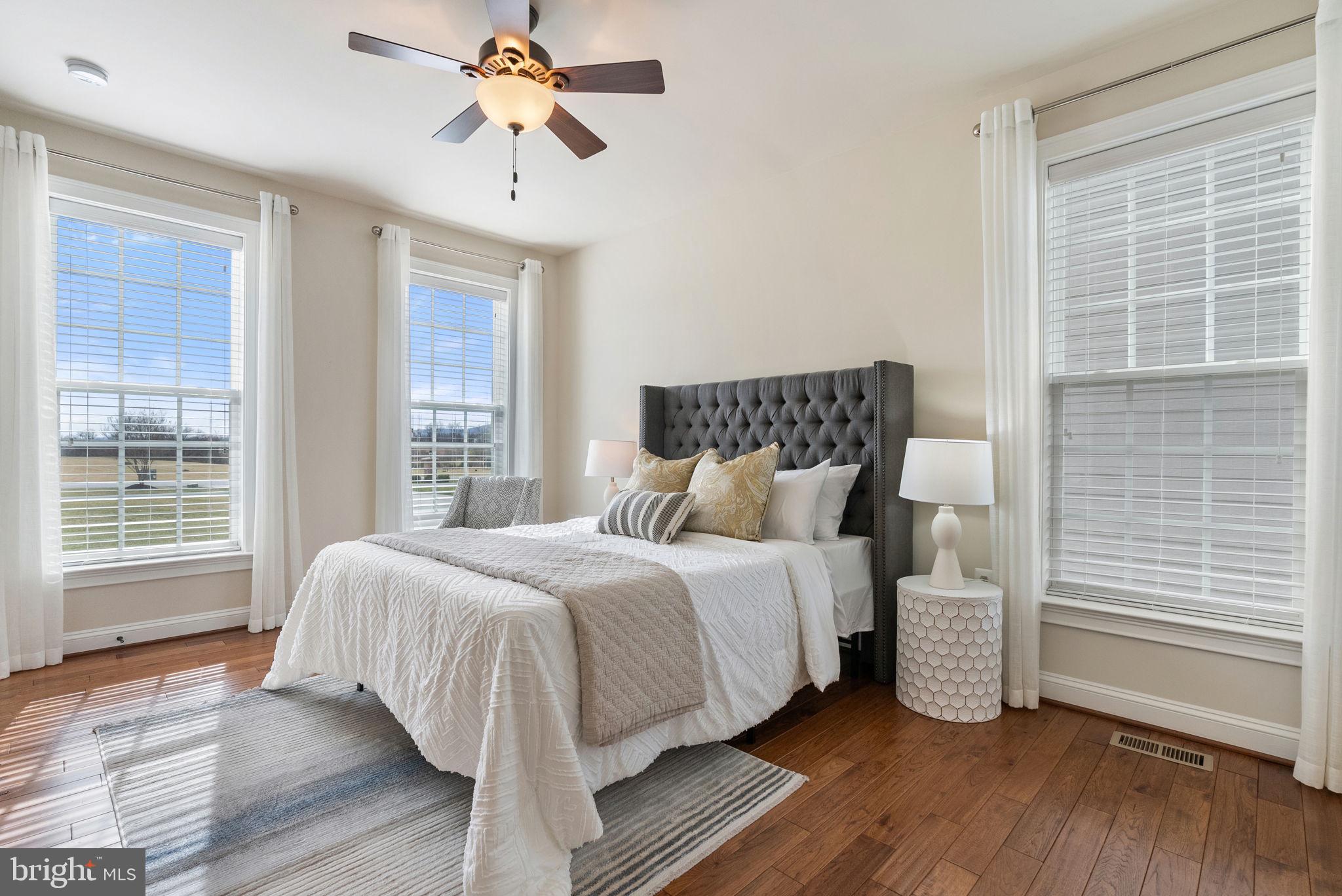 18482 Wild Raspberry Drive Purcellville, VA 20132 - Photo 119 of 143 a bedroom with a bed and a window