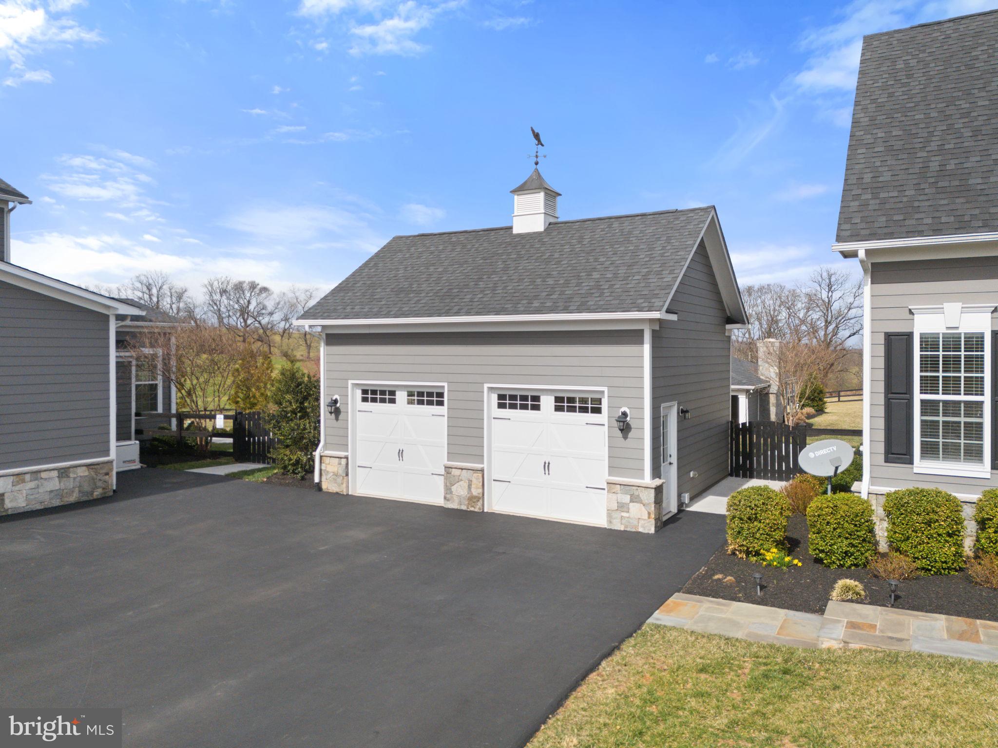 18482 Wild Raspberry Drive Purcellville, VA 20132 - Photo 133 of 143 a front view of a house with a yard