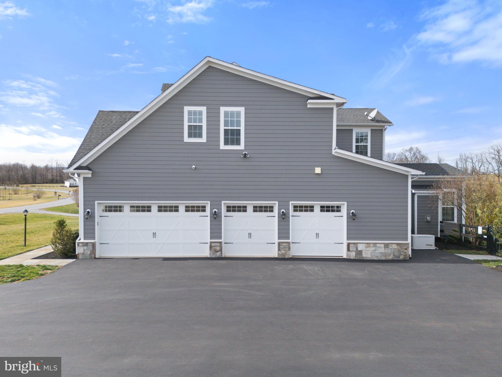 18482 Wild Raspberry Drive Purcellville, VA 20132 - Photo 134 of 143 a view of a house with yard