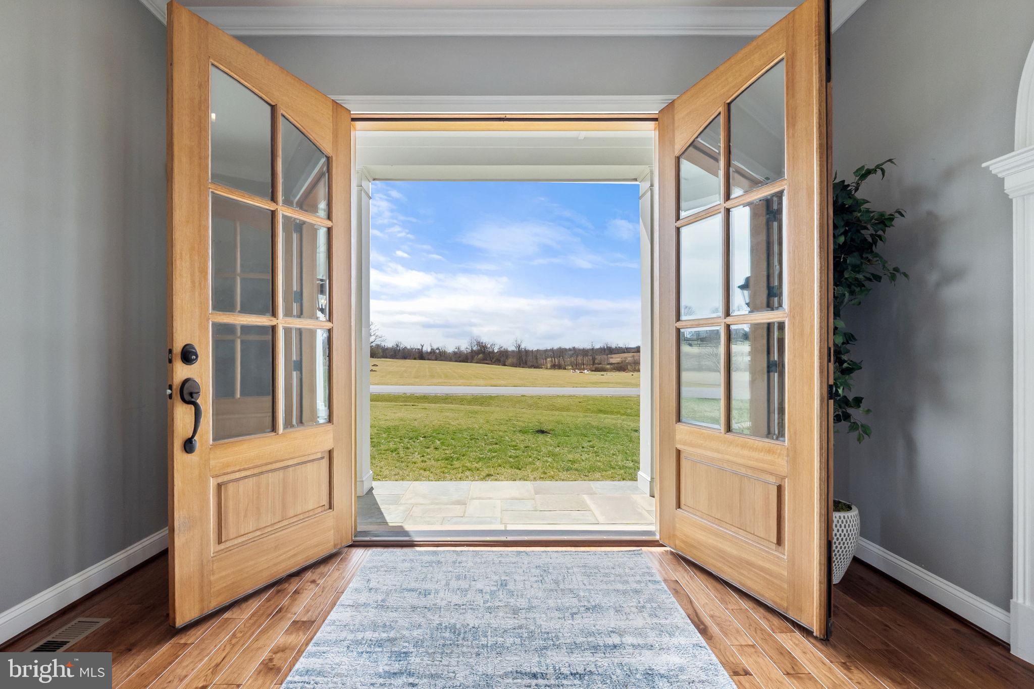 18482 Wild Raspberry Drive Purcellville, VA 20132 - Photo 20 of 143 a view of a living room and front door